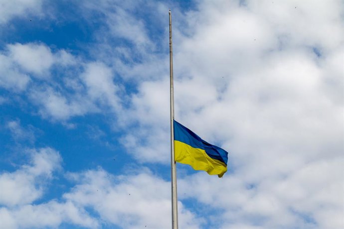 July 7, 2026, Kyiv, Ukraine: The national flag of Ukraine flies at half-mast on the flagpole at Maidan Nezalezhnosti Square during a Day of Mourning for the victims of a Russian attack, Kyiv, Ukraine, on July 7, 2026. Overnight into July 6, Russian forces