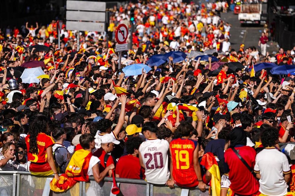 The Spanish stands follow the speaker's music during the parade celebration of Spain as Champions of the FIFA World Cup 2026 at Cibeles Palace on July 20, 2026 in Madrid, Spain.