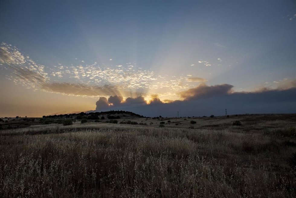 El sol es eclipsado por el humo de los incendios, a 23 de julio de 2026, en Navalcarnero, Madrid (España).