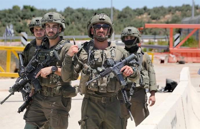 July 19, 2026, Qalqilya, West Bank, Palestine: sraeli soldiers are stationed at the closed entrance to the town of Azzun, east of Qalqilya in the West Bank during the demonstration. Palestinians have been demonstrating since October 7, 2023, against the I