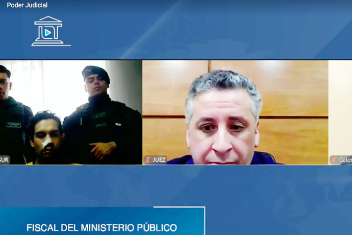 Santiago, 24 de julio de 2026. Audiencia de formalizacion de la investigacion de Carlos Cancino, alias El Rana, por el homicidio del carabinero Marco Cosme y homicidio frustrado de otros dos funcionarios. Pantallazo via Aton Chile