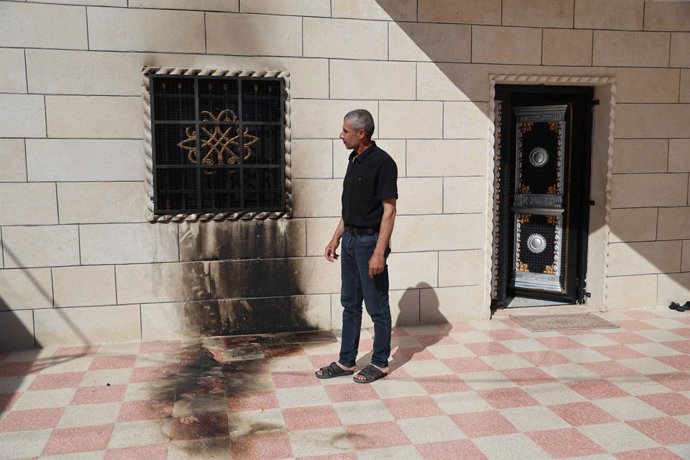 July 19, 2026, At-Tuwani, Palestine, State of: AT-TUWANI, WEST BANK - JULY 19, 2026: Residents inspect the aftermath of an attack by Israeli settlers, including attempted arson targeting a mosque, homes and vehicles, in the village of At-Tuwani in the Mas