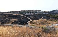 Reabierta la A-7 en Algeciras (Cádiz) tras quedar controlado un incendio de pastos en la zona de Los Alamillos