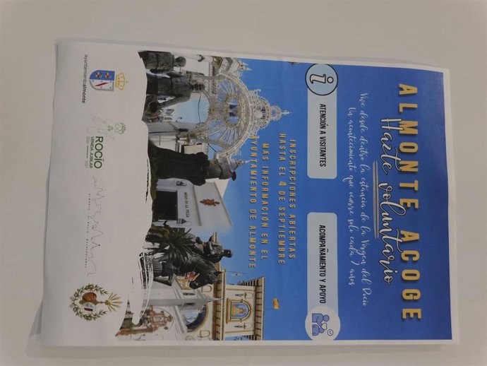 Cartel de 'Almonte Acoge'.