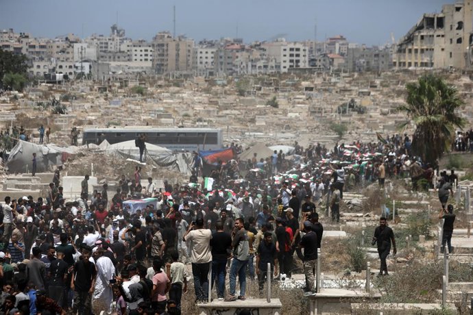 August 4, 2026, Gaza City, Gaza Strip, Palestinian Territory: Palestinians take part in a mass funeral for the recovered remains of members of the Abu Sharia and Al-Hasayna families in the Sabra neighborhood of Gaza City on August 4, 2026. The remains wer