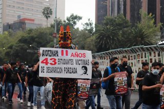 Archivo - Marcha en memoria de los 43 estudiantes desaparecidos de Ayotzinapa, en Ciudad de México