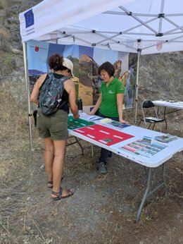 Punto de información del programa de divulgación ambiental 'La Red Natura 2000 en tu pueblo'.