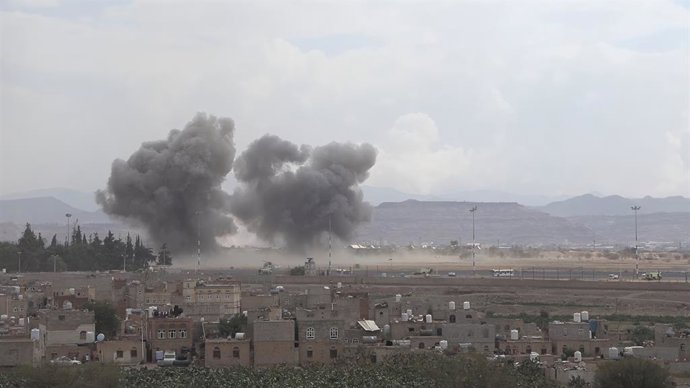 SANAA, July 13, 2026  -- Smoke rises after airstrikes on Sanaa International Airport in Sanaa, Yemen, July 13, 2026. Houthi-run Al-Masirah TV said Monday Saudi Arabia launched several airstrikes on the runways of Sanaa International Airport in the Houthi-