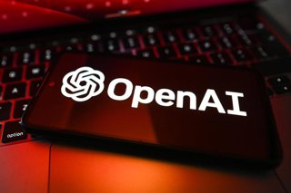 Archivo - May 4, 2026, Poland: In this photo illustration, an OpenAI logo is displayed on a smartphone on top of a laptop.