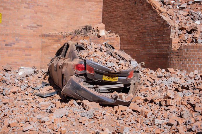 CALI, Aug. 10, 2026  -- Photo taken on Aug. 10, 2026 shows a damaged car after an earthquake in Cali, Colombia. Colombia declared a state of national disaster on Monday after a magnitude 7.4 earthquake struck the country's west earlier in the day and kill
