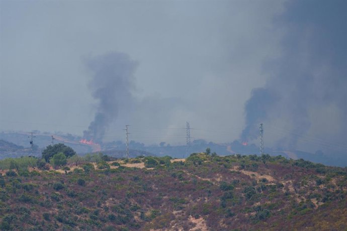 Imágenes del avance del incendio de Niebla en el término municipal de Aznalcollar. 
