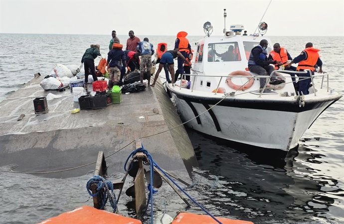 HARARE, Aug. 12, 2026  -- Photo taken with a mobile phone shows rescuers conducting search and rescue operations at the site of a boat capsize on Lake Kariba in Mashonaland West Province, Zimbabwe, on August 12, 2026. Zimbabwean President Emmerson Mnangag