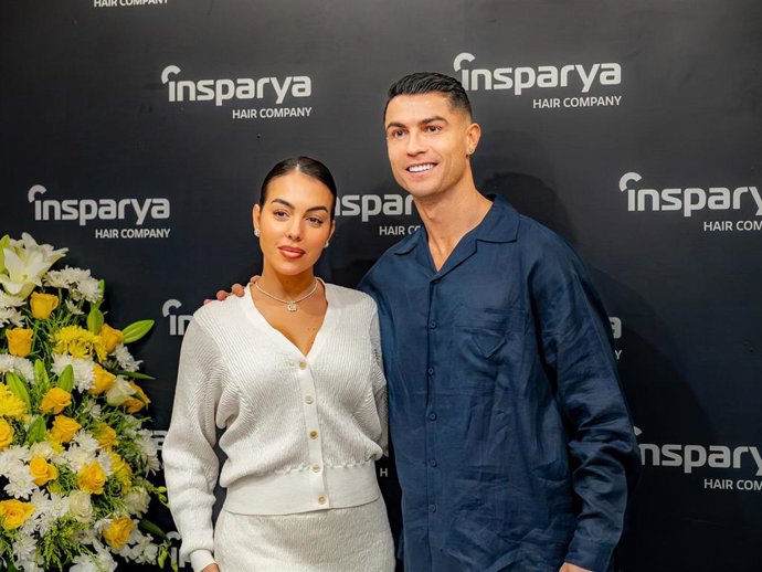 Archivo - Georgina Rodríguez y Cristiano Ronaldo posando en un photocall