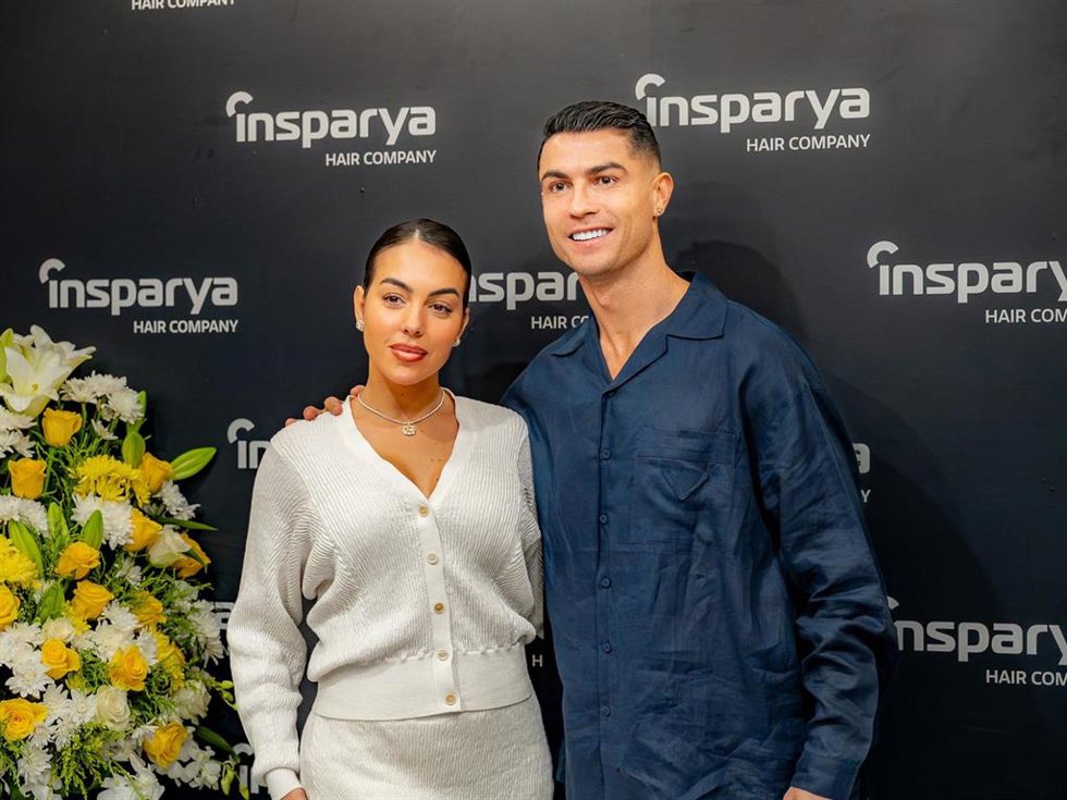 Archivo - Georgina Rodríguez y Cristiano Ronaldo posando en un photocall
