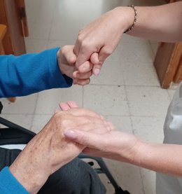 Paciente y profesional de cuidados paliativos