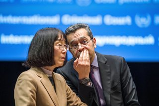Archivo - December 1, 2025, The Hague, South Holland, Netherlands: The President of the International Criminal Court, Judge TOMOKO AKANE, speaks with a colleague before the opening of the 24th Session of the ASP. On 1 December 2025, the Assembly of States