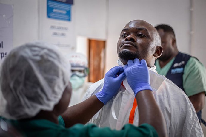 KINSHASA, Aug. 19, 2026  -- A medical worker puts on a protective suit at an Ebola treatment center in Beni, North Kivu Province, the Democratic Republic of the Congo, Aug. 16, 2026. The World Health Organization (WHO) said Tuesday that the Ebola outbreak
