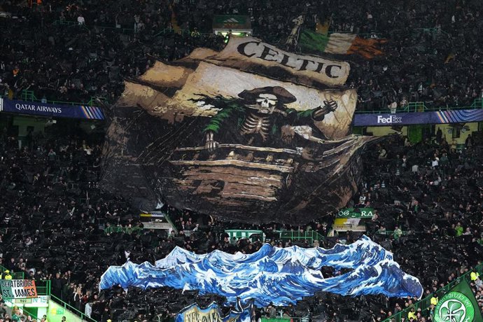 19 August 2026, United Kingdom, Glasgow: A large banner depicting a ship with a skeleton and the words 'Celtic' is pictured in the stands before the UEFA Champions League play-off first leg soccer match between Celtic and LASK at Celtic Park. Photo: Andre
