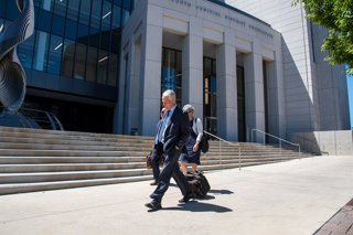 Archivo - June 12, 2026, Provo, Utah, USA: Defense attorneys RICHARD NOVAK, left, and MICHAEL BURT, right, walk outside the Fourth District Court during a full evidentiary hearing for Tyler Robinson in Provo, Utah. Robinson's defense team argued that the 