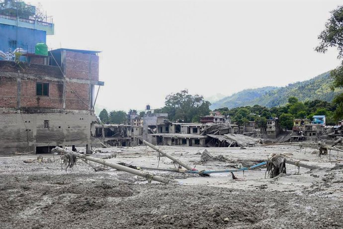 August 27, 2026, Nuwakot, Nepal: NUWAKOT, NEPAL, AUGUST 26, 2026: Houses and other structures in Trishuli Devighat Bazaar, Nuwakot, are seen damaged following flooding in the Bhotekoshi River in Rasuwa.,Image: 1128794223, License: Rights-managed, Restrict