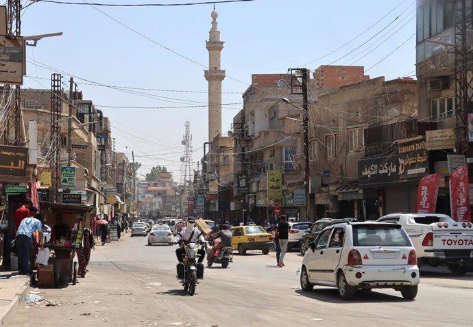 DAMASCUS, Aug. 26, 2026  -- Vehicles run at a street in Hasakah, a major city in northeastern Syria, where the Kurdish-led Syrian Democratic Forces (SDF) had maintained a strong presence, Aug. 25, 2026. SDF commander Mazloum Abdi announced Tuesday the dis