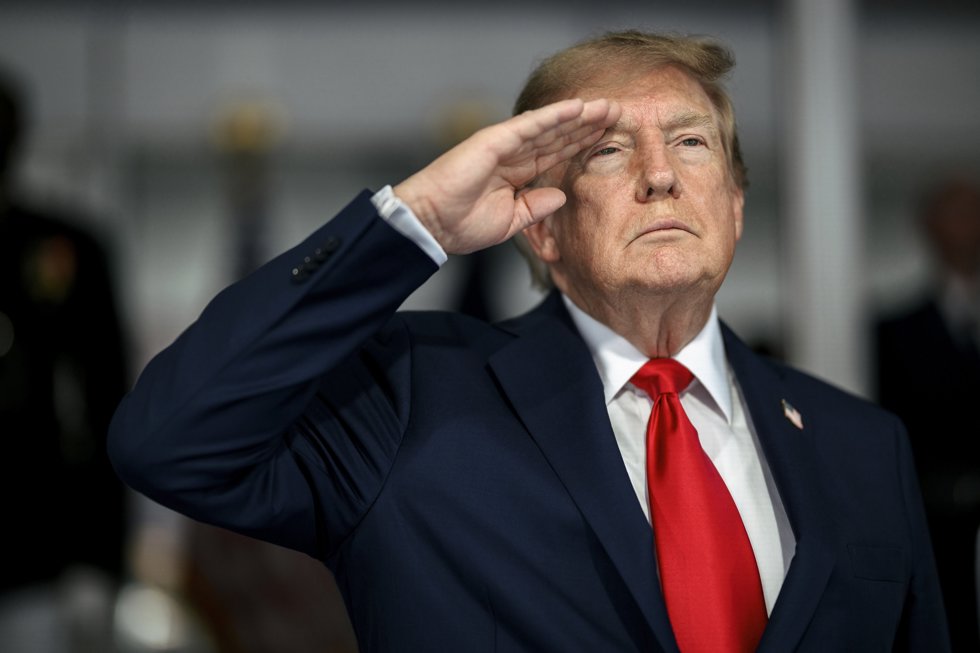 August 24, 2026, Washington, Dc, United States: U.S. President Donald Trump, salutes during the national anthem before the start of the Freedom 250 Grand Prix Race, August 23, 2026 in Washington, D.C.