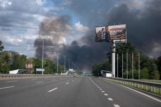 August 27, 2026, Kyiv Region, Ukraine: A plume of black smoke rises from the scene of a Russian strike in the Boryspil district of the Kyiv region, Ukraine, August 27, 2026. The Russian army targeted distribution centres and logistics warehouses of Ukrain