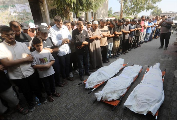 August 26, 2026, Gaza City, Gaza Strip, Palestinian Territory: Palestinians attend the funeral of three people at al-Shifa Hospital in Gaza City on August 26, 2026, after they were killed in an Israeli strike in Jabalia refugee camp, in the northern Gaza 