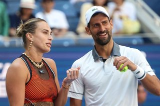 25 August 2026, US, New York City: Serbian tennis player Novak Djokovic (R) and Belarusian Aryna Sabalenka in action against British Henry Patten and Czech Katerina Siniakova during their mixed doubles round of 16 match of the US Open tennis tournment. Ph