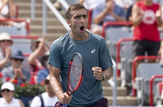 09 August 2026, Canada, Montreal: Spanish tennis player Daniel Merida Aguilar celebrates defeating Netherlands' Tallon Griekspoor during their men's singles round of 16 match of the ATP Masters 1000 National Bank Open at IGA Stadium in Montreal. Photo: Ch