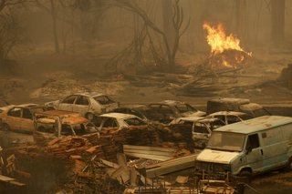 BEIJING, Aug. 27, 2026  -- This photo taken on Aug. 27, 2026 shows the aftermath of wildfires in a village in the mountains of Jijel, northeastern Algeria. At least 12 people were killed in wildfires that swept three provinces in northeastern Algeria, Int