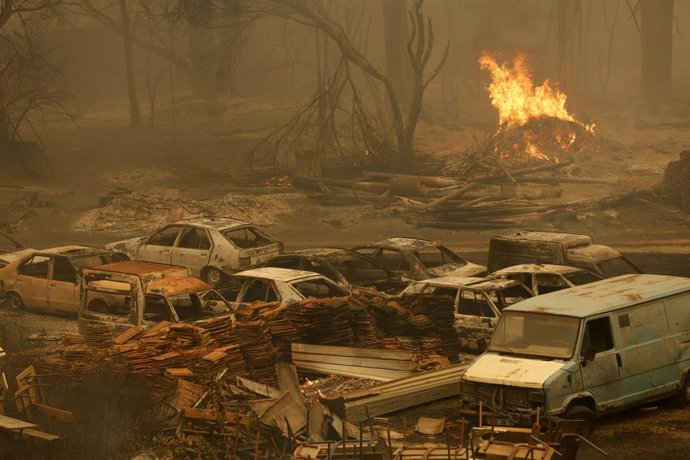BEIJING, Aug. 27, 2026  -- This photo taken on Aug. 27, 2026 shows the aftermath of wildfires in a village in the mountains of Jijel, northeastern Algeria. At least 12 people were killed in wildfires that swept three provinces in northeastern Algeria, Int