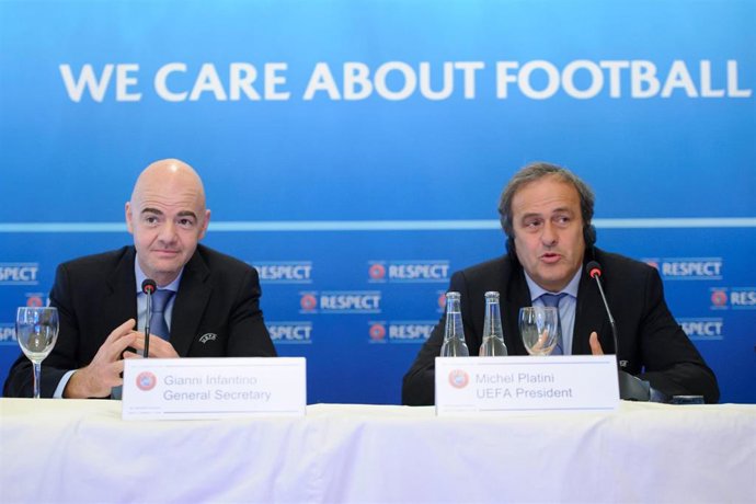 Archivo - Michel Platini y Gianni Infantino en su época como presidente y secretario generla de la UEFA
