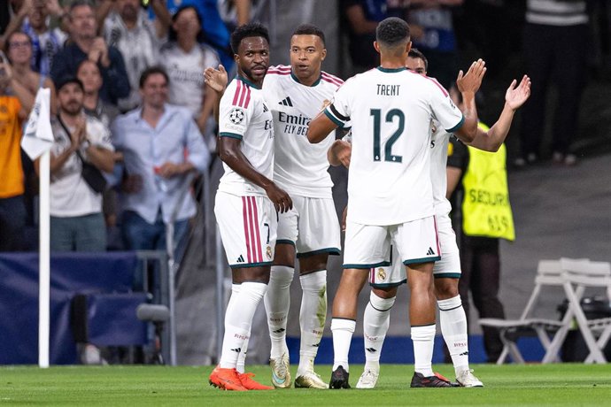 Kylian Mbappe y Vinícius celebran un gol en Champions.