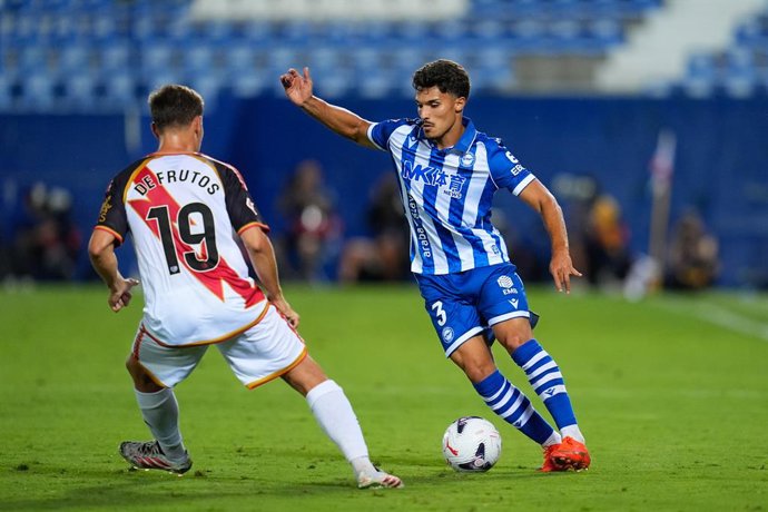 Youssef Enriquez of Deportivo Alaves and Jorge de Frutos of Rayo Vallecano compete for the ball during the Spanish League, LaLiga EA Sports, football match played between Rayo Vallecano and Deportivo Alaves at Butarque stadium on August 20, 2026, in Legan