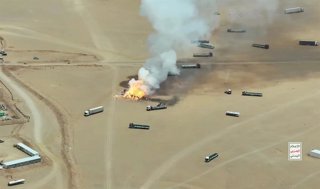 HADRAMOUT, Sept. 8, 2026  -- A screenshot shows trucks burning after they were targeted by ballistic missiles launched by Houthi group near Al-Wadiah military camp in Hadramout province, Yemen on Sept. 7, 2026. Yemen's Houthi group said Monday that it had