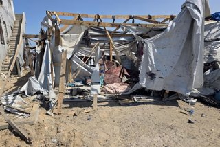 September 14, 2026, Khan Yunis, Gaza Strip, Palestinian Territory: Palestinians inspect the site of an Israeli strike that targeted a tent housing displaced people in the al-Mawasi area of Khan Younis, southern Gaza Strip, on September 14, 2026. The strik
