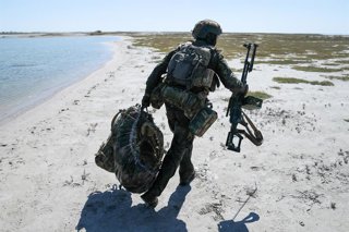 RUSSIA, KHERSON REGION - SEPTEMBER 11, 2026: A serviceman has a river crossing drill as part of assault infantry training with the Dnepr Group of Forces in the rear area of Russia's special military operation