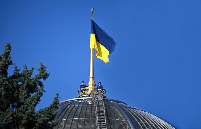 September 4, 2026, Kyiv, Ukraine: Honour guards flank the national flag hoisted on the flagpole crowning the dome of the Ukrainian Parliament during a ceremony marking 35 years since the raising of the blue-and-yellow flag over the Verkhovna Rada, Kyiv, U