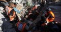 Aumentan a 21 muertos, 12 de ellos niños, por derrumbe de un edificio en el norte de Gaza