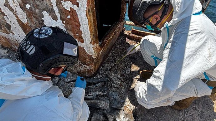 MANILA, Sept. 14, 2026  -- Rescuers inspect the charred wreckage of a passenger vessel in Palawan Province, the Philippines, on Sept. 14, 2026.   Rescue teams have completed searches of about 65 percent of the cargo hold of the passenger vessel that caugh
