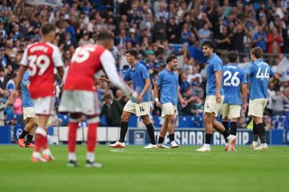 19 September 2026, United Kingdom, Brighton: Brighton and Hove Albion's Charalampos Kostoulas (C-R) celebrates scoring his side's second goal during the English Premier League soccer match between Brighton and Hove Albion and Arsenal at Vitality Stadium. 
