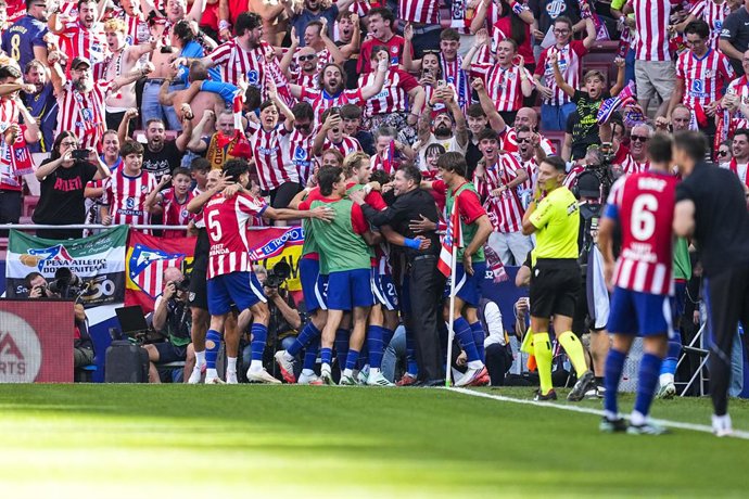 Jonathan David, do Atlético de Madrid, comemora um gol durante a partida de futebol da Liga Espanhola, LaLiga EA Sports, disputada entre o Atlético de Madrid e o Real Madrid CF no estádio Riyadh Air Metropolitano, em 20 de setembro de 2026, em Madri, Espa