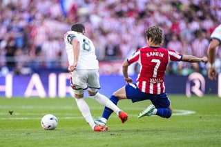 Federico Valverde of Real Madrid CF and Kang-in Lee of Atletico de Madrid in action during the Spanish League, LaLiga EA Sports, football match played between Atletico de Madrid and Real Madrid CF at Riyadh Air Metropolitano stadium on September 20, 2026,