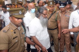 COLOMBO, Sept. 23, 2026  -- Individuals convicted in connection with the 2019 Easter Sunday attacks are escorted after the trial in Colombo, Sri Lanka, Sept. 23, 2026. A court in Sri Lanka's Colombo on Tuesday delivered the verdict in the Easter Sunday te
