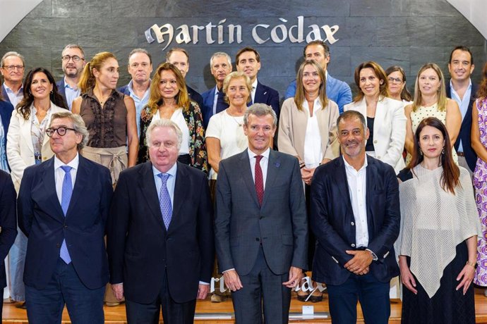 Rueda y la conselleira, en el acto de la federación española de vino
