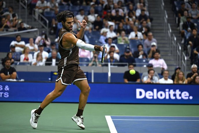 NEW YORK, Sept. 3, 2026  -- Carlos Alcaraz reutrns a shot during the men's singles second round match between Carlos Alcaraz of Spain and Jaime Faria of Portugal at the 2026 US Open tennis championships in New York, the United States, Sept. 2, 2026.,Image