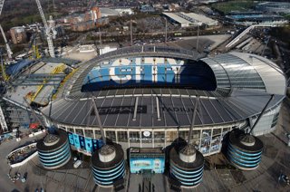 Archivo - FILED - 19 March 2025, United Kingdom, Manchester: An aerial view of Etihad Stadium, home of Manchester City. Manchester City and the Premier League have reached a settlement in their dispute over the rules governing associated party transaction
