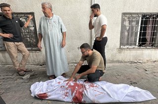 October 2, 2026, Gaza City, Gaza Strip, Palestinian Territory: Palestinians mourn a man at al-Shifa Hospital after he was killed in an Israeli airstrike on a tent in Gaza City, on October 2, 2026
