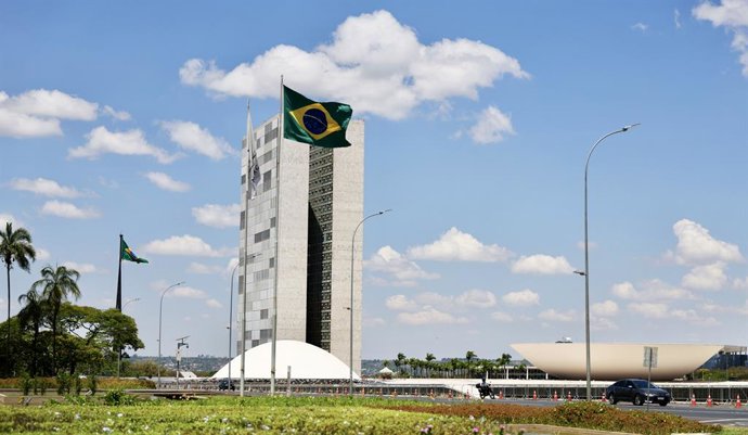 BRASILIA, Sept. 25, 2026  -- This photo taken on Sept. 24, 2026 shows the Brazilian national flag and the National Congress of Brazil in the background in Brasilia, Brazil. The city of Brasilia, with a population of approximately 3 million, is the capital